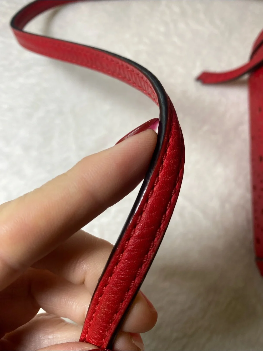 kate spade Perri Lane Bubbles Looloo red laser-cut crossbody